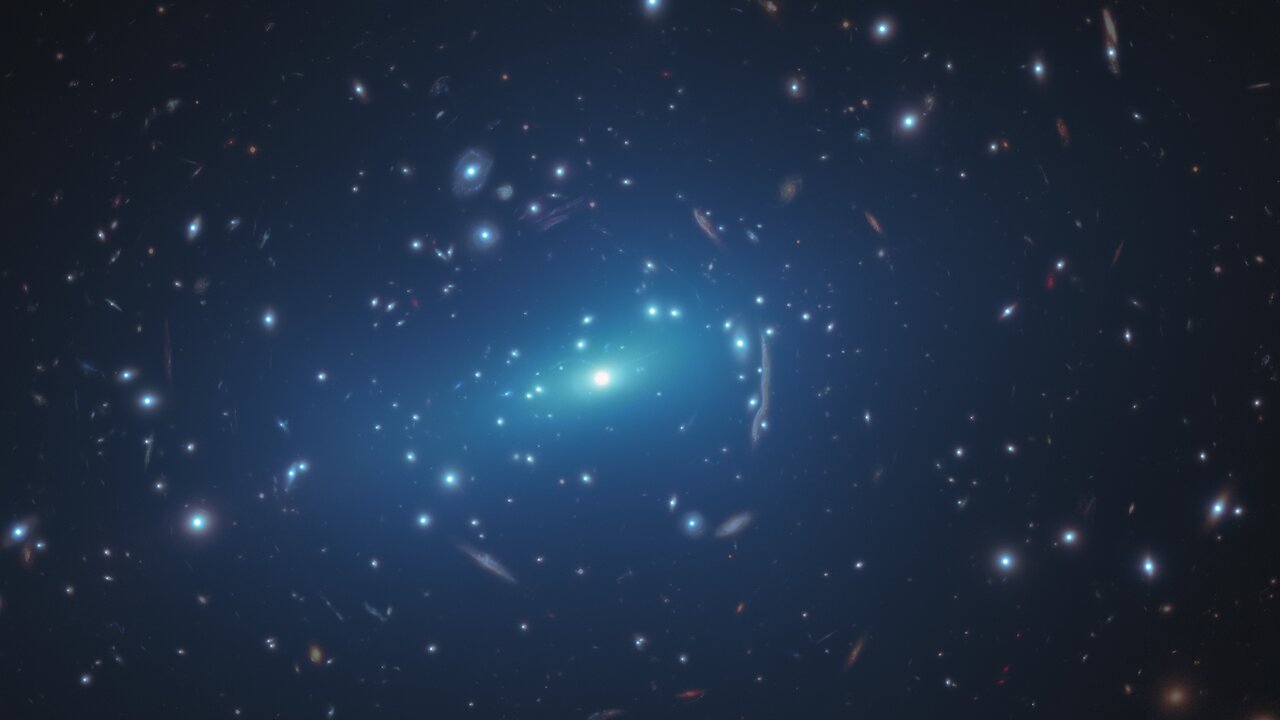 Hubble image of MACS J1206 with an artist's blue dark matter overlay